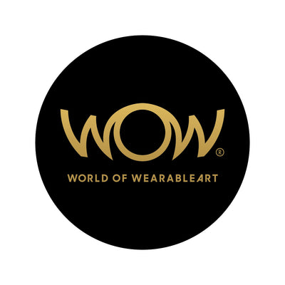 Logo of World of WearableArt with 'WOW' in gold on a black circle